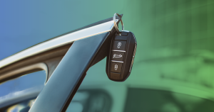 A modern car key fob held in hand, symbolizing convenient access to new or certified pre-owned vehicles for smart financial decisions.